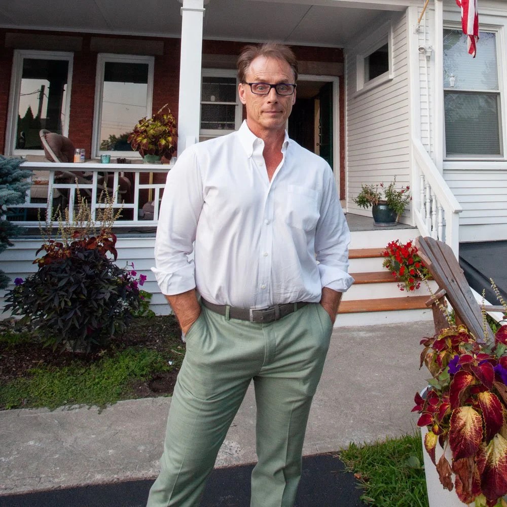Bill Del-Sette, host of Happiness in Retirement, standing outside his Schenectady office